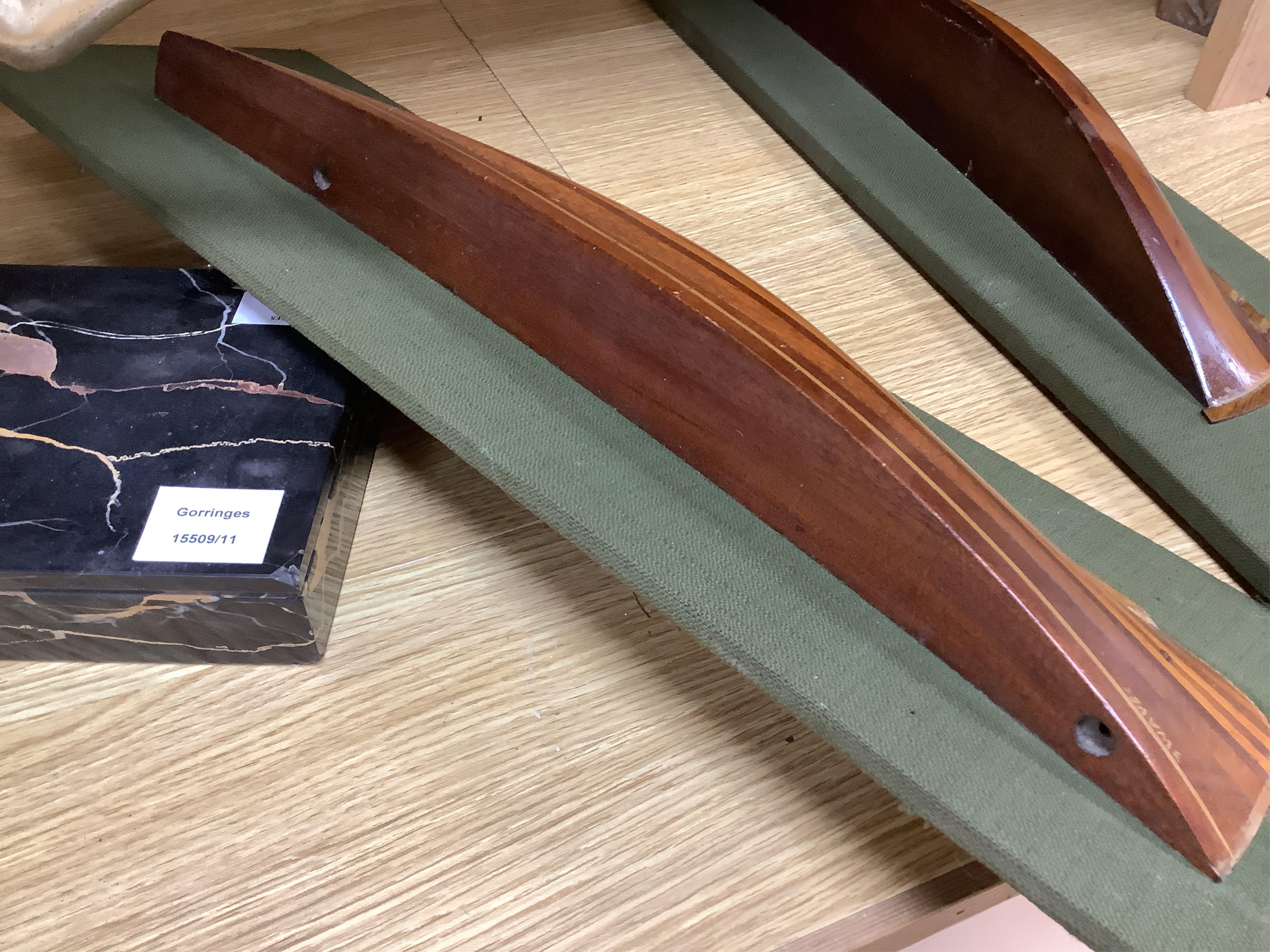 Two mounted cross banded mahogany and yew wood split hull models. Condition - fair to good